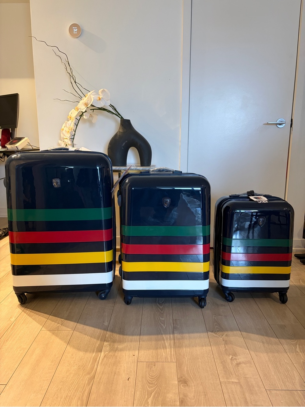 Heys x Hudson’s Bay Navy Hard-Shell 3-piece Luggage Set with Multicolor Stripes